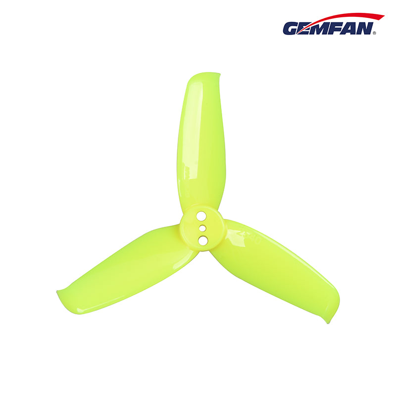 Neon yellow-green 3-blade FPV drone propeller with 3-bolt mounting holes, top view