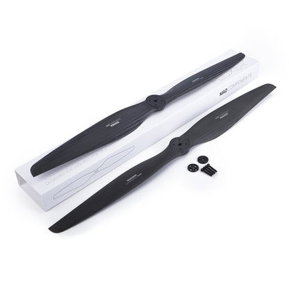 MAD FLUXER carbon fiber eVTOL propeller set with two blades, mounting bolts and hub plates on box