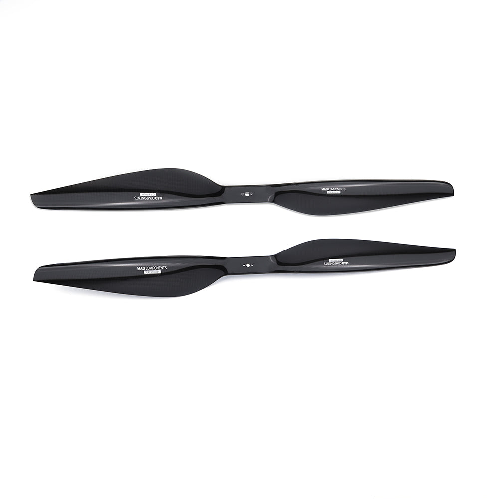 Pair of MAD FLUXER Pro Shine glossy black drone propellers with slim 2-blade design and center mounting holes