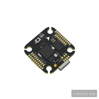 Angled underside view of the Argus H743 Mini flight controller with USB-C connector, boot button, processor, and solder pads.