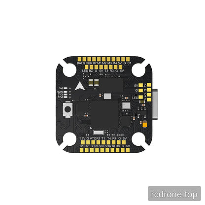 Rear side of the Argus H743 Mini flight controller showing gold solder pads, USB-C port, boot button, and pad labels.