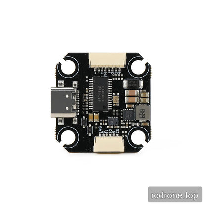 Reverse side of the compact flight controller, showing the USB-C port, two board connectors, integrated components, and four mounting cutouts.