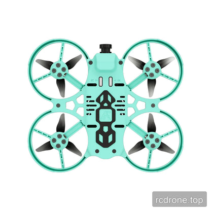 Underside view of the mint green ducted FPV drone, showing four propellers, frame screws, and black base details.