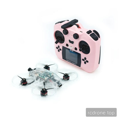 Clear translucent ducted FPV drone displayed beside a pink radio controller with a screen, switches, and control sticks.