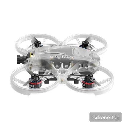 Low side view of the clear translucent ducted FPV drone, showing its front camera, enclosed propellers, and frame contours.