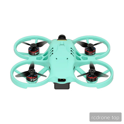 Rear view of the mint green ducted FPV drone, showing the propeller guards, rear battery area, and camera housing.