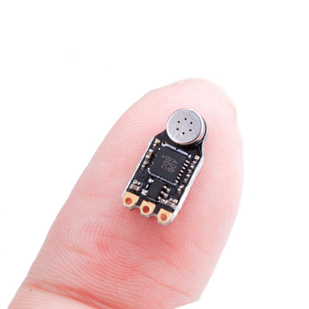 Flywoo AGC-MIC Nano VTX microphone module with metal mic capsule and three solder pads on a tiny PCB