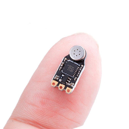 Flywoo AGC-MIC Nano VTX microphone module with metal mic capsule and three solder pads on a tiny PCB