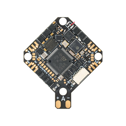 BETAFPV F4 2-3S 20A AIO flight controller underside showing STM chip, plug connector, and +/− pads