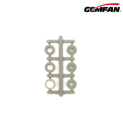 Propeller adapter rings/spacers on a plastic sprue, multiple sizes in light gray