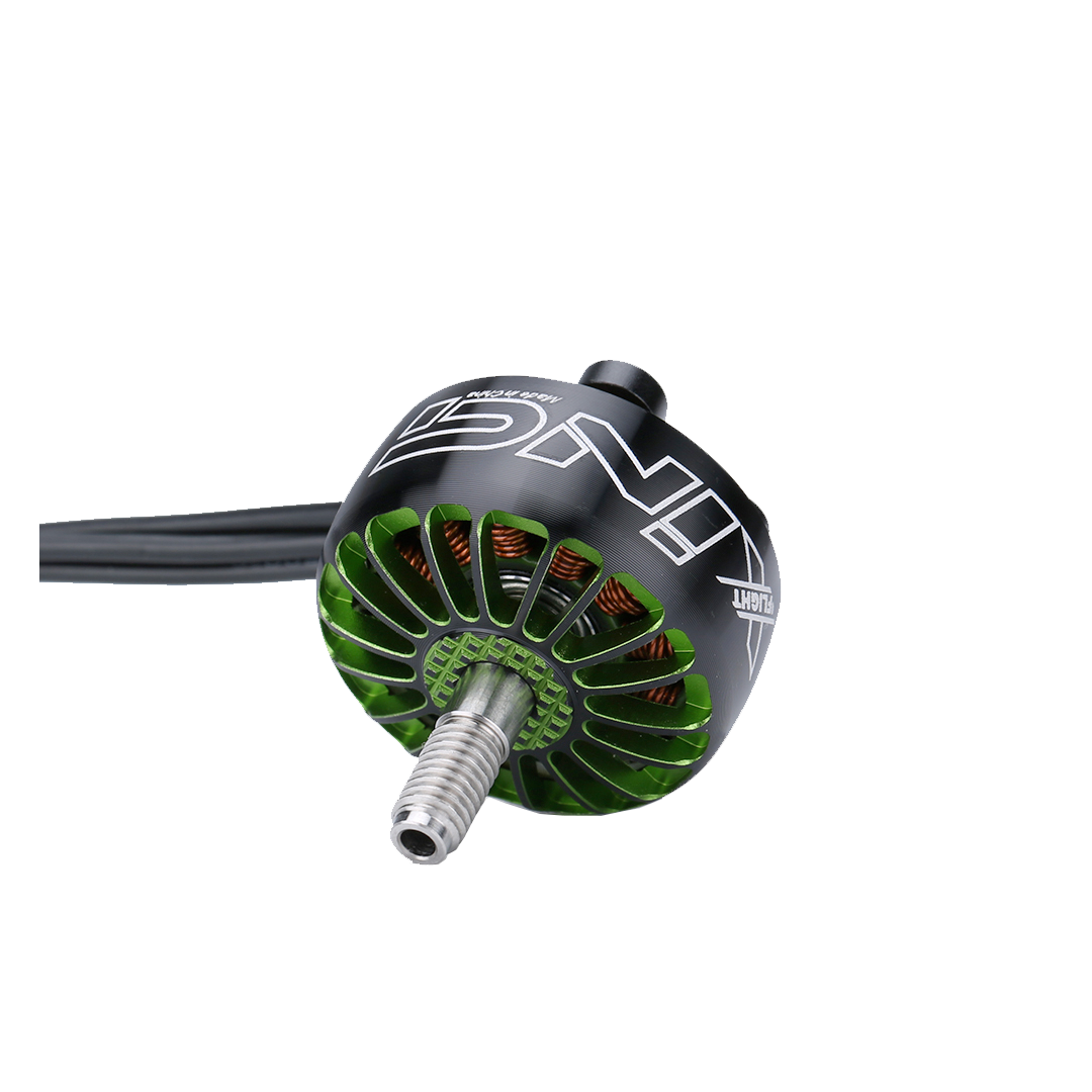 iFlight XING 2208 1800KV 3-6S FPV Motor, Close-up of iFlight XING 2208 FPV brushless motor with green base, copper windings and threaded prop shaft