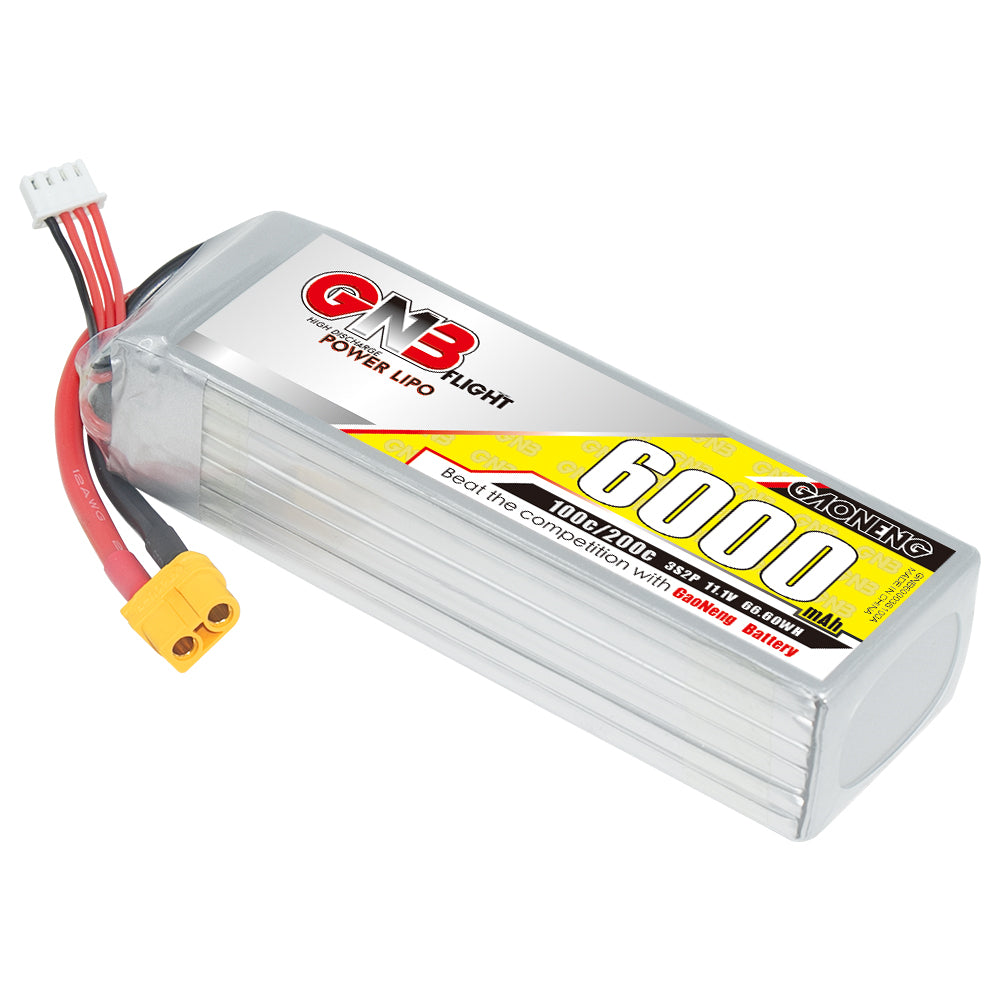 Angled view of GNB 6000mAh LiPo pack showing ribbed shrink wrap, label, XT60 plug and balance lead