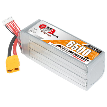 Angled view of GNB 6500mAh 6S LiHV LiPo battery showing ribbed case, XT90 plug, and balance connector