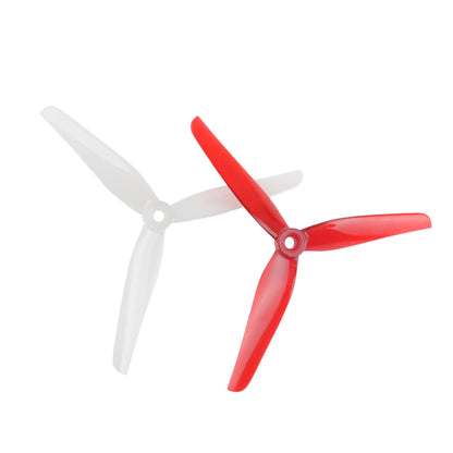 Ethix P4 5.1in 3-blade propeller, candy cane red and white, close-up of hub and blades