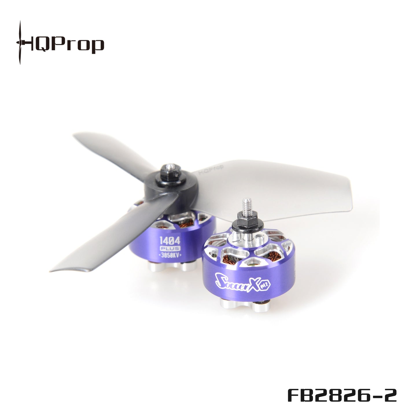 Grey 3-blade propeller mounted on brushless motor, angled view showing hub and blades