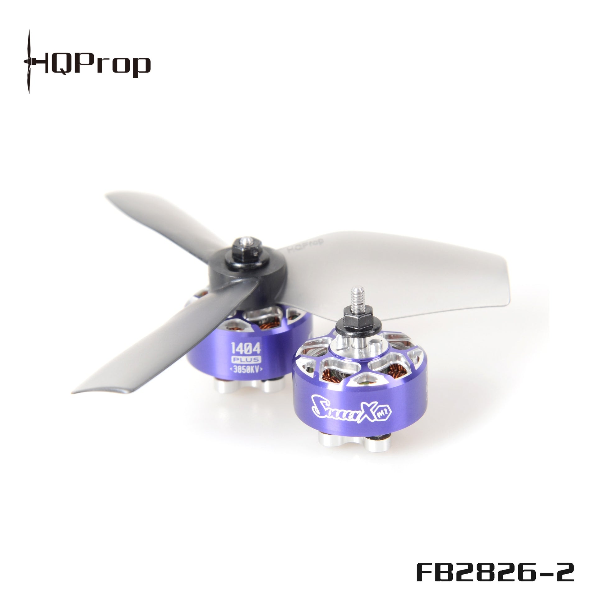 Grey 3-blade propeller mounted on brushless motor, angled view showing hub and blades