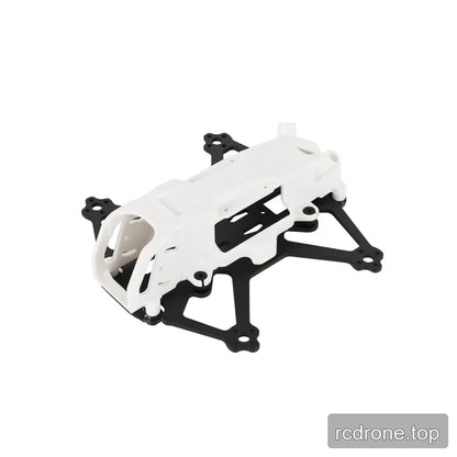 White and black DeepSpace DINO 20 FPV frame kit in a three-quarter front-left view with camera cage and arm layout.