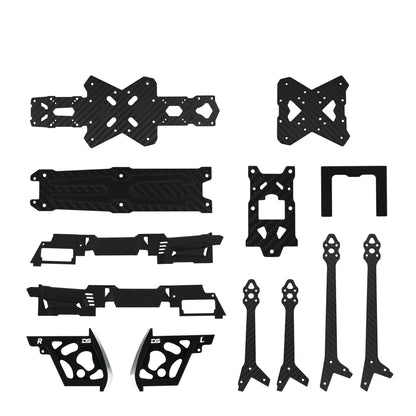 Assorted black carbon-fiber-pattern FPV drone frame plates, arms, side panels, and small mounting pieces.