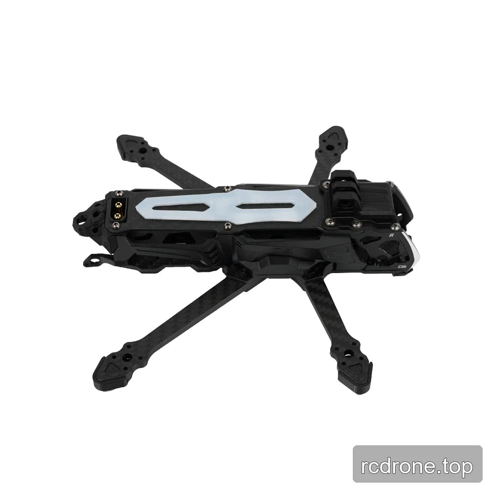Black DeepSpace SEEKER35 FPV frame shown from above at an angle, with pale slotted top plate and carbon-fiber arms.