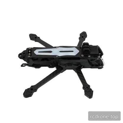 Black DeepSpace SEEKER35 FPV frame shown from above at an angle, with pale slotted top plate and carbon-fiber arms.