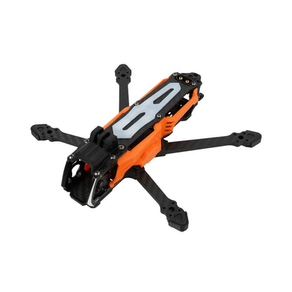 DeepSpace SEEKER35 FPV frame in orange and black, shown from an elevated front-left angle with four carbon-fiber arms.