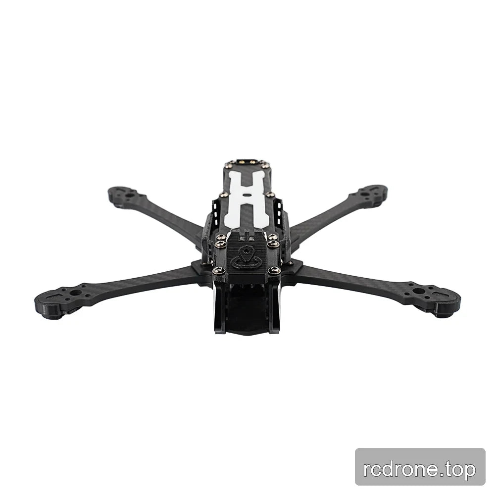 DeepSpace SEEKER5 carbon-fiber FPV frame kit viewed head-on, showing the front camera cage, top plate, and motor arms.