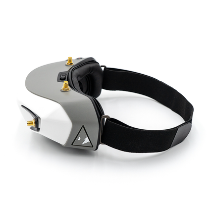 Fat Shark Dominator HD FPV Goggle left-side profile with head strap, side antenna port, and logo badge