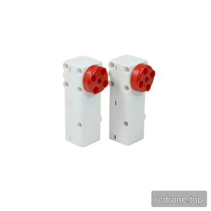 Rear three-quarter view of two upright white DSpower DS-E025A servo motors with red circular output hubs.