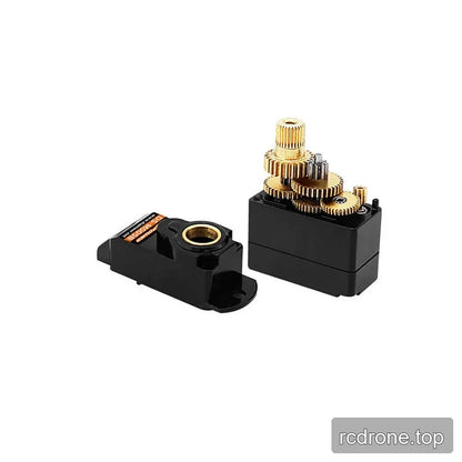 Opened DSpower DS-M005B servo housing displaying an exposed set of brass-colored internal gears.