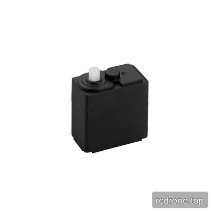 Black DSpower DS-R005 servo motor shown at an angled three-quarter view with its white output shaft and top cap.