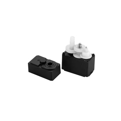 Opened black DSpower DS-R005 servo motor showing white internal gears, output shaft, and separated top cover.