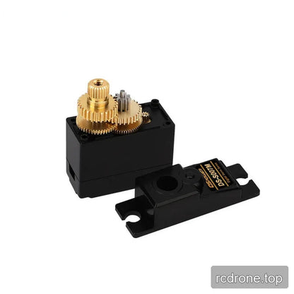 Opened DS-S007M servo housing showing the internal metal gear train, gold output gear, and removed top cover.