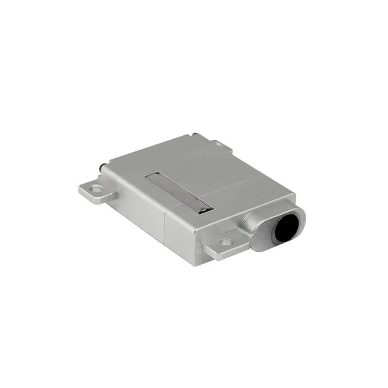 Silver DSpower DS-W009A servo motor in a low rear-side view showing the rounded end opening, mounting tabs, and top recess.