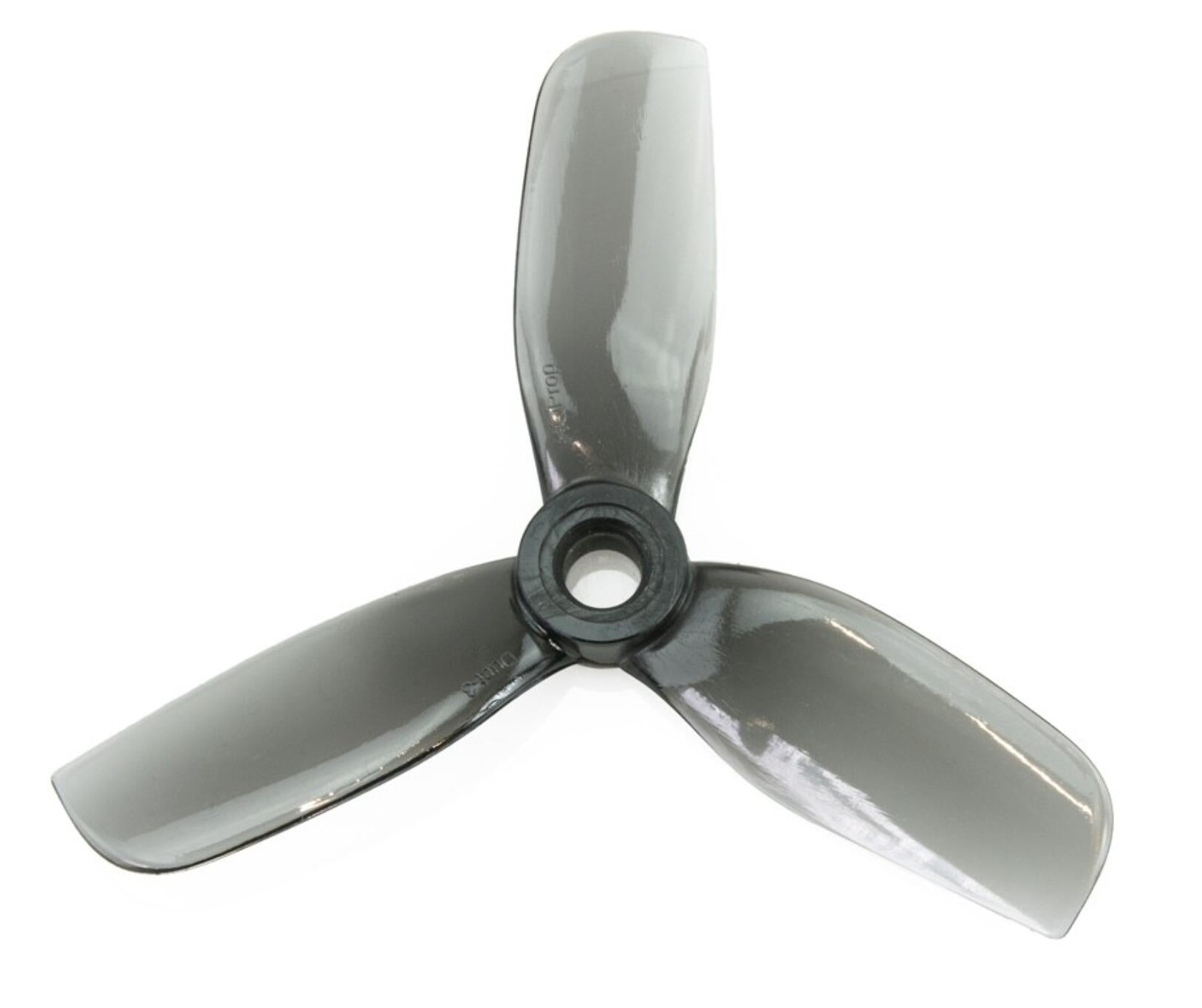 3-blade cinewhoop drone propeller in smoke gray, top view showing blade profile and hub opening