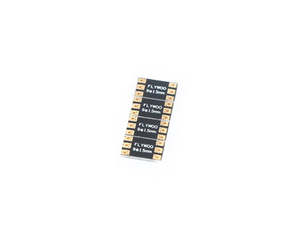 Stack of FLYWOO 9x15mm frame arm boards with solder pads on both ends for FPV drone builds