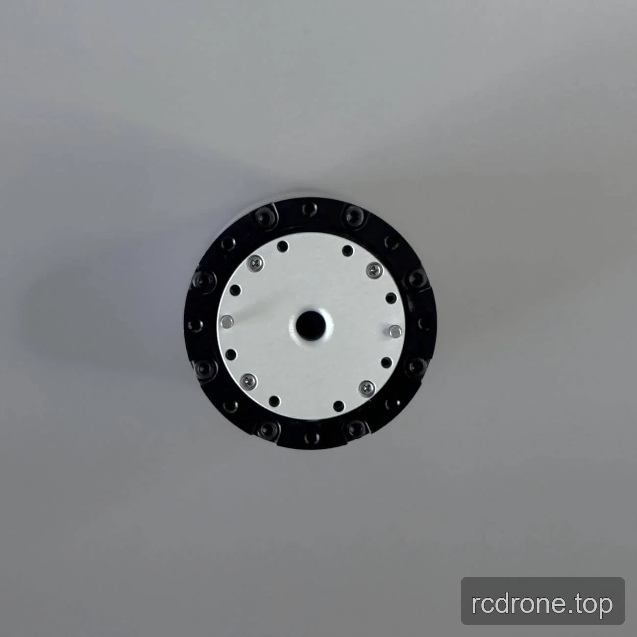 PH11 circular mounting face with central opening and peripheral holes