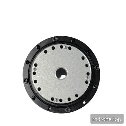 Close view of the motor faceplate showing the central opening and concentric rings of mounting holes