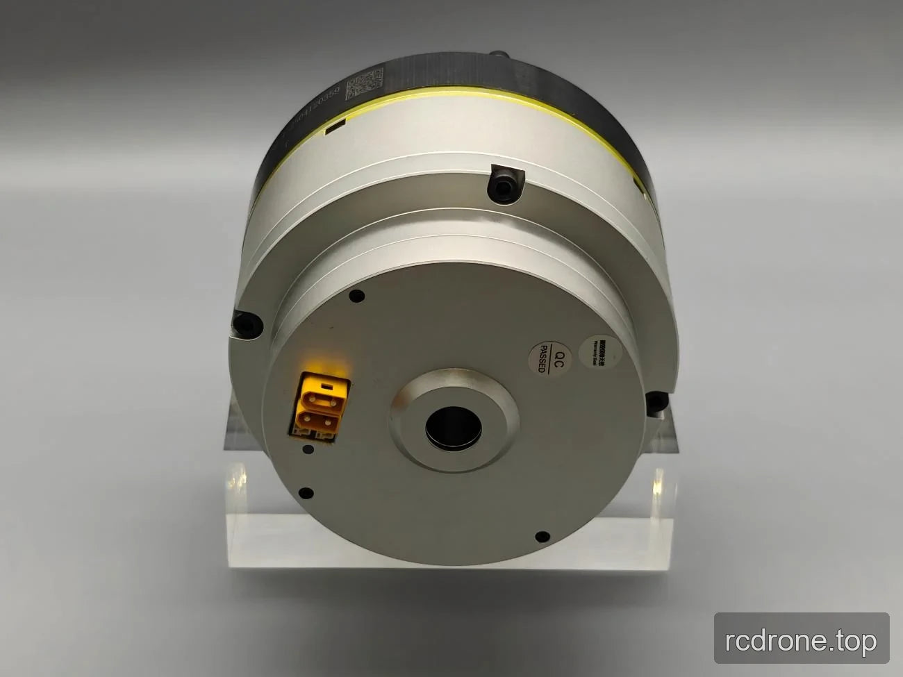 Underside motor view with central bore and electrical connectors
