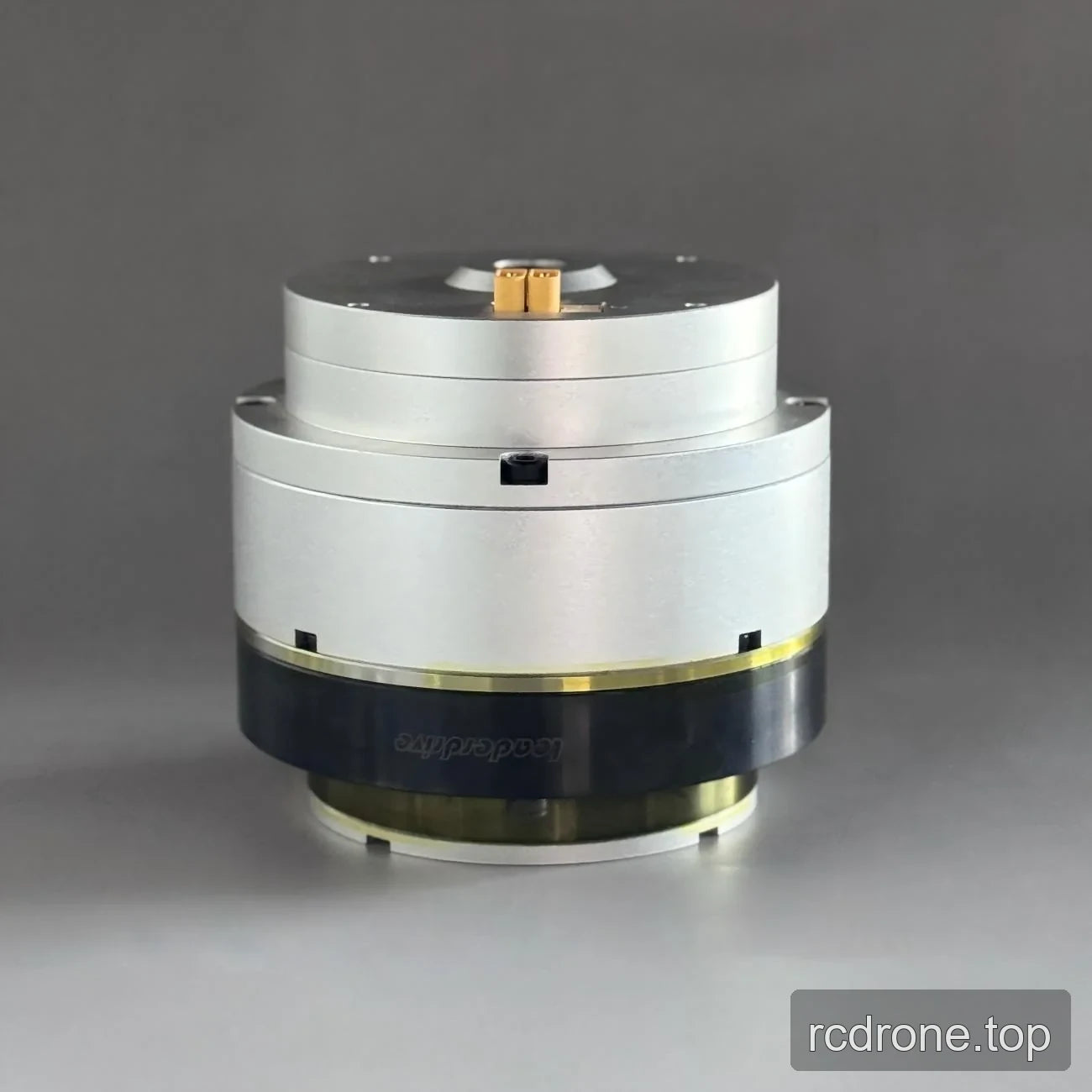 Side view of cylindrical motor assembly with yellow connector