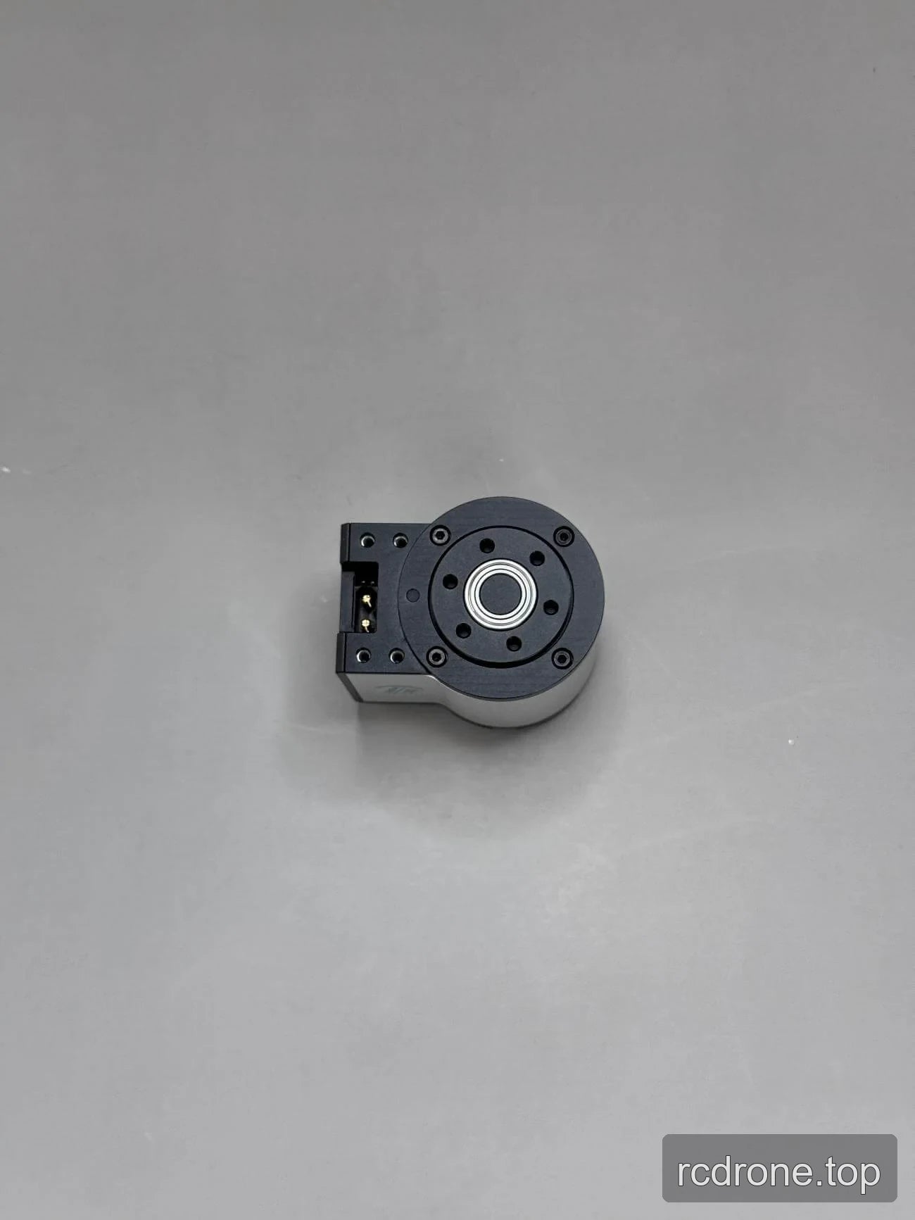 Motor end view with circular mounting plate and two-contact connector