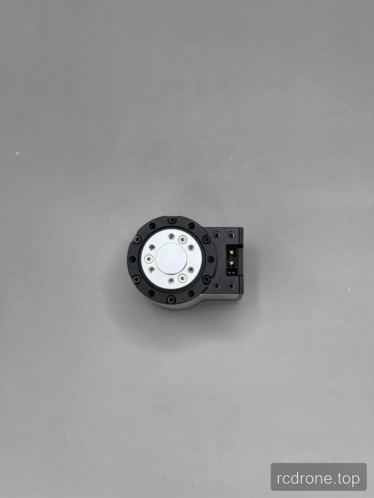 Compact motor view with metal mounting flange and connector extension