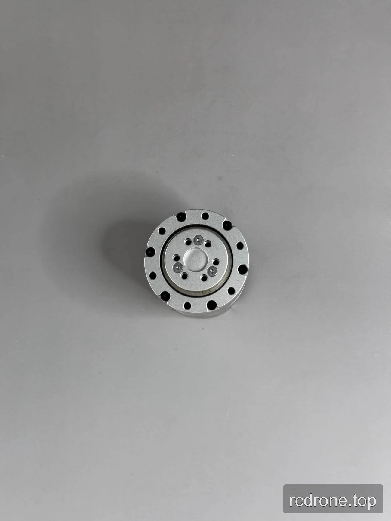 Front view of motor circular mounting face with perimeter holes