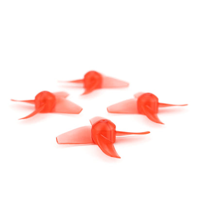 Low-angle view of four red 40mm quadcopter propellers showing hub height and blade pitch