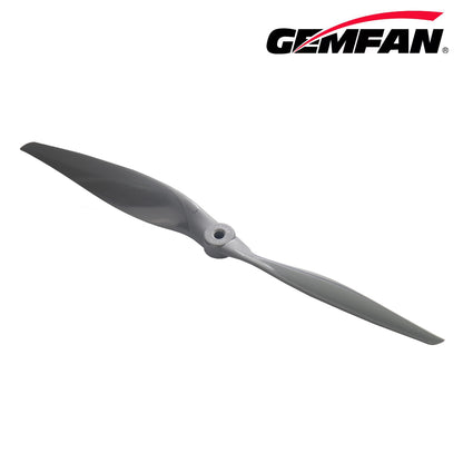 Oblique angle view of dark gray propeller highlighting leading edge shape and center hub opening
