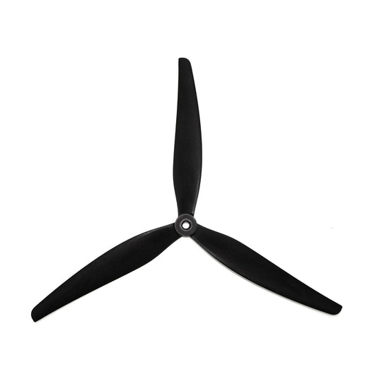 Black 3-blade drone propeller top view with central hub, isolated on white background