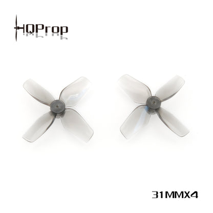 Two translucent gray 4-blade micro whoop props with HQProp logo and 31MMX4 marking