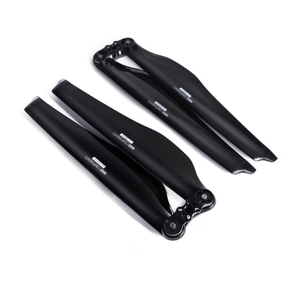 Black glossy carbon fiber folding propeller set with two-blade assemblies and mounting hubs