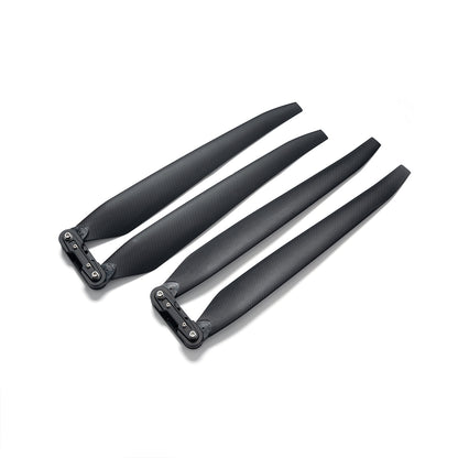 MAD TIPUP 56x20in Polymer Folding Propeller, Pair of black MAD TIPUP polymer folding propeller blades with hinge hubs for tip-up mounting