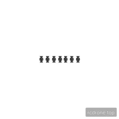 Seven small black damping balls arranged in a row on a plain white background.