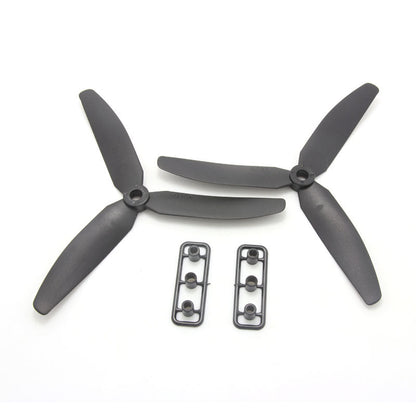 Black 3-blade propellers with two small mounting hardware strips on white background